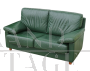 Vintage style sofa in green leather