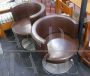 Set of 4 vintage swivel armchairs by Antonio Astori in brown skai