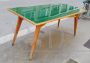 Vintage dining table with green glass top