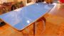 Vintage 50s table with light blue glass top and inlaid central leg