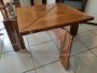 Extendable square table designed by Silvio Coppola for Bernini