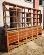 Large industrial wooden cabinet with shelves and drawers