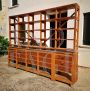 Large industrial wooden cabinet with shelves and drawers