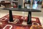 Table designed by Angelo Mangiarotti in black Marquina marble with oval top
