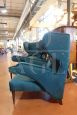 Pair of vintage wraparound armchairs in petrol blue velvet