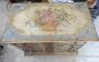 Antique chest of drawers from the 17th century painted with gold leaf