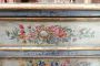 Antique chest of drawers from the 17th century painted with gold leaf