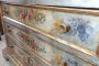 Antique chest of drawers from the 17th century painted with gold leaf
