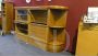 Modular bookcase with central body and two corner cupboards