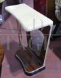 Pair of art deco parchment consoles with mirror