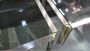 Coffee table in brass and steel with smoked glass, 1960s