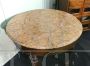 Round table from the 19th century with pink marble top