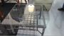 Industrial style coffee table with glass top