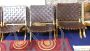 Design folding armchairs in woven leather