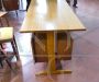 Vintage teak wood desk with iron footrest