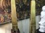 Pair of gilded wooden obelisks with porphyry effect base
