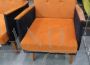 Pair of vintage design armchairs in wood and orange fabric