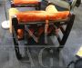 Samurai armchair and ottoman by Frigerio in orange alcantara