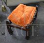 Samurai armchair and ottoman by Frigerio in orange alcantara