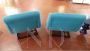 Pair of 70s design armchairs with single wooden foot