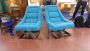 Pair of 70s design armchairs with single wooden foot