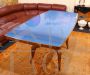 Vintage 50s table with light blue glass top and inlaid central leg                         
                            