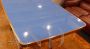 Vintage 50s table with light blue glass top and inlaid central leg