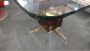 Tartaro table by Frigerio and Desio in glass, padduk wood and brass