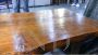 Coffee table with thick cherry wood top in a single plank
