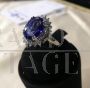 White gold ring with diamonds and large central tanzanite                