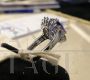 White gold ring with diamonds and large central tanzanite