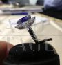 White gold ring with diamonds and large central tanzanite
