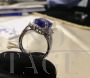 White gold ring with diamonds and large central tanzanite