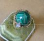 Gold ring with diamonds and malachite         