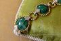 Gold bracelet with diamonds and malachite