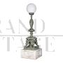 Pair of bronze outdoor lamps with Roman style sculptures on marble base