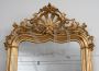 Antique Louis Philippe mirror in gilded and carved wood