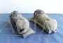 Pair of small sculptures of sleeping lions, inspired by Antonio Canova