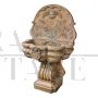 Wall fountain with cherub in red Verona marble