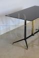 Coffee table in black glass, brass and iron, Italy 1950s