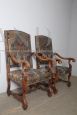 Pair of early 1900s antique armchairs in solid walnut and damask fabric