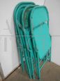 Set of 4 folding chairs in light blue metal