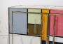 Vintage 1970s dresser covered in colored glass