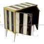 Sideboard with black and white glass stripes