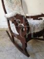 Antique Louis Philippe sculpted and carved rocking armchair