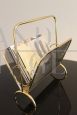 Magazine rack in brass and black lacquered metal, Italy 1970s
