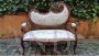 Antique Liberty Art Nouveau living room with sofa and two armchairs