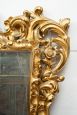 Antique Louis XV style mirror in gilded and carved wood