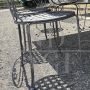 Garden set with 6 chairs and a large wrought iron table