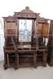 Imposing antique cupboard in carved solid walnut with mirror, 19th century